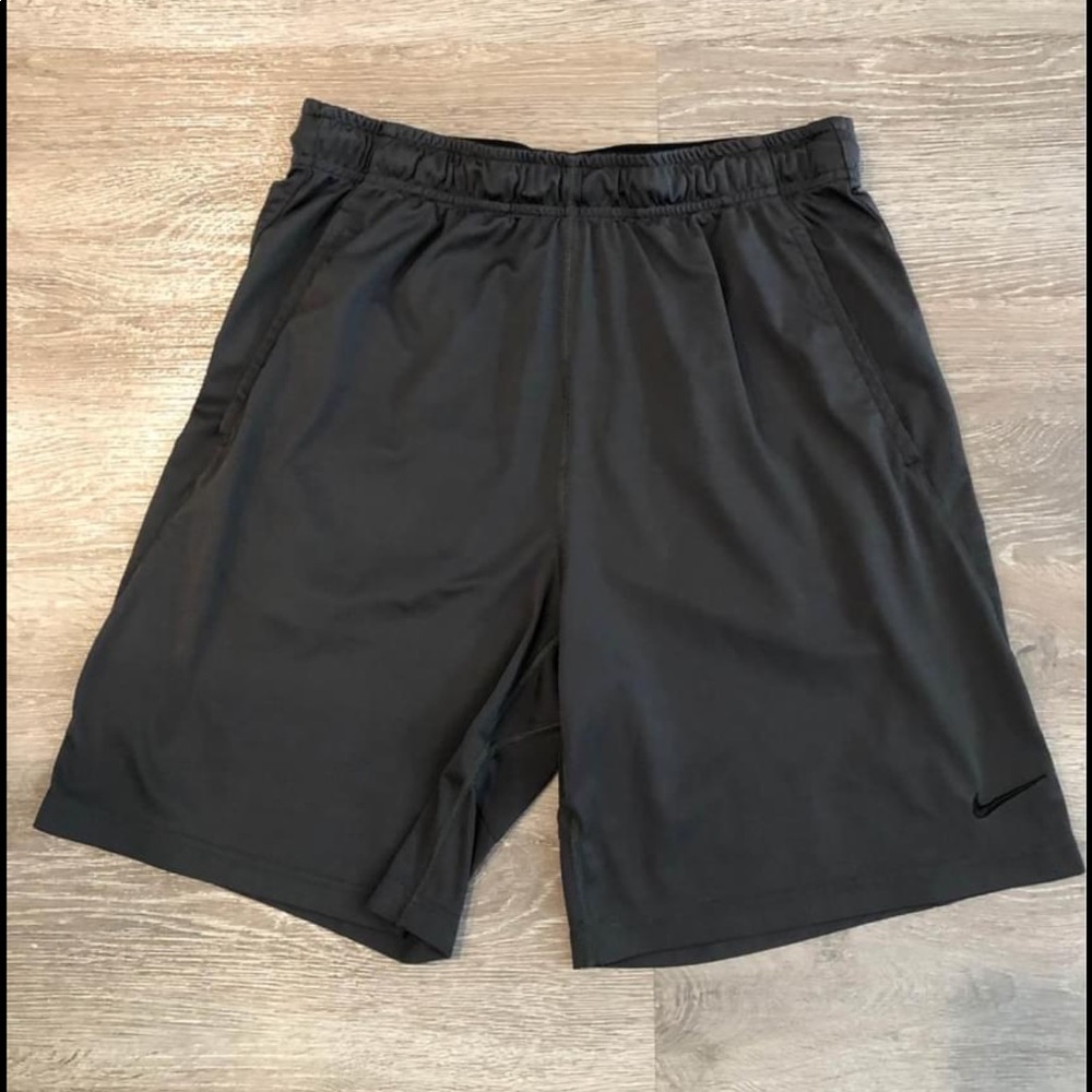 Men’s dark grey Nike Dri-Fit shorts. Size: large.